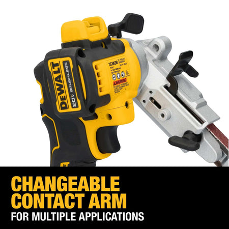 Close-up technical view of the DEWALT bandfile pivot mechanism with a text overlay: Changeable Contact Arm for Multiple Applications. This demonstrates the tool's versatility for various deburring and finishing tasks.