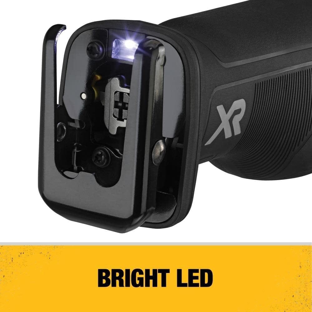 Front view of DEWALT XR reciprocating saw with illuminated LED light near blade clamp, highlighting visibility features for low-light work areas.