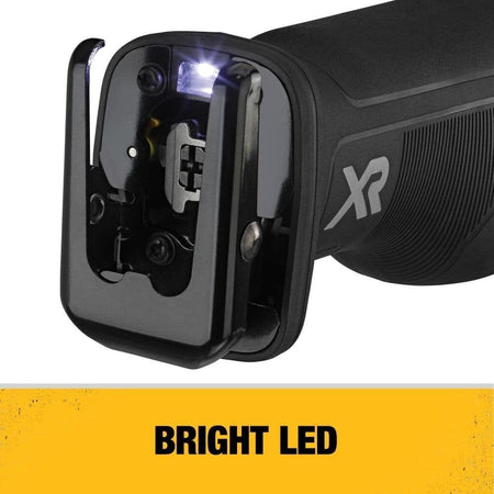 Front view of DEWALT XR reciprocating saw with illuminated LED light near blade clamp, highlighting visibility features for low-light work areas.