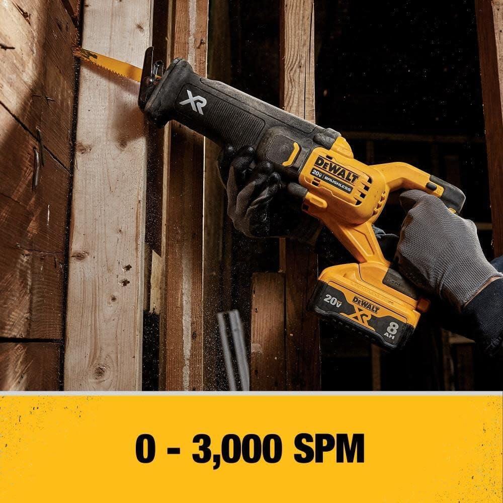 Person using DEWALT XR reciprocating saw with 20V 8Ah battery to cut wood, demonstrating active use and tool performance in a construction setting.