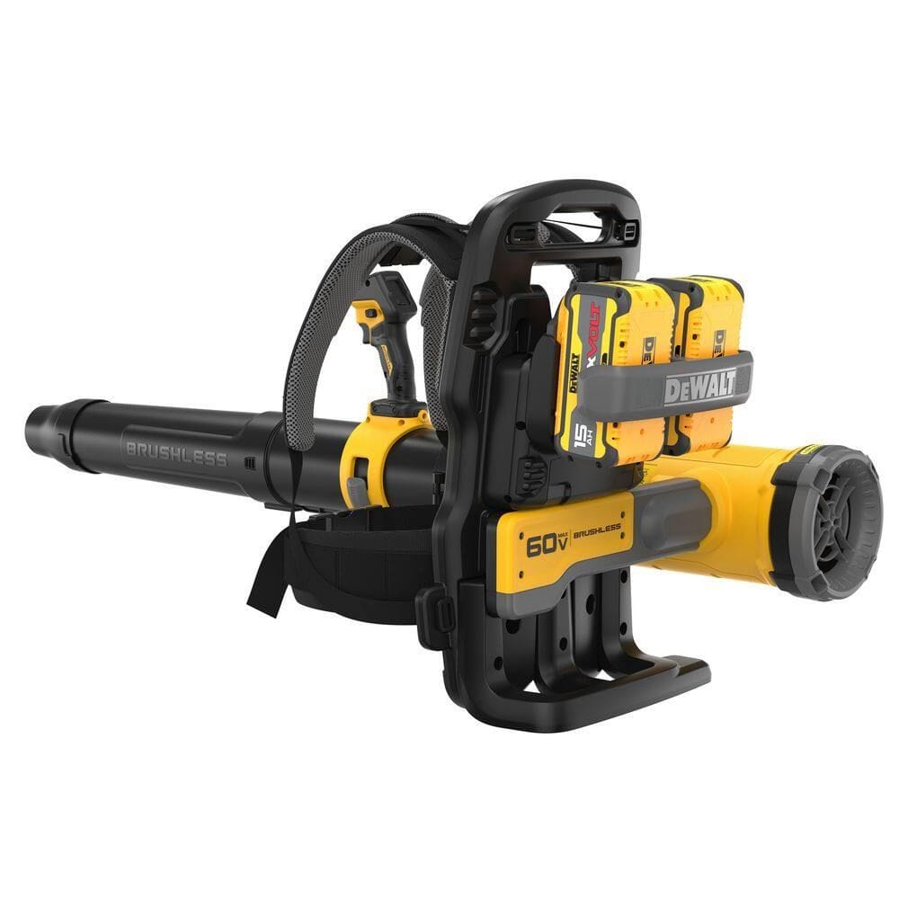 A perspective view of the DEWALT cordless backpack blower showing the dual battery compartment with two high-capacity FLEXVOLT batteries installed. The rugged design and heavy-duty battery strap emphasize the tool's readiness for high-power, gas-equivalent performance on the jobsite.