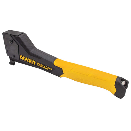 Rear angled view of the DEWALT DWHT75900 carbon fiber staple gun showing the drop-in loading magazine and comfortable hammer-style grip for reduced muscle exertion.