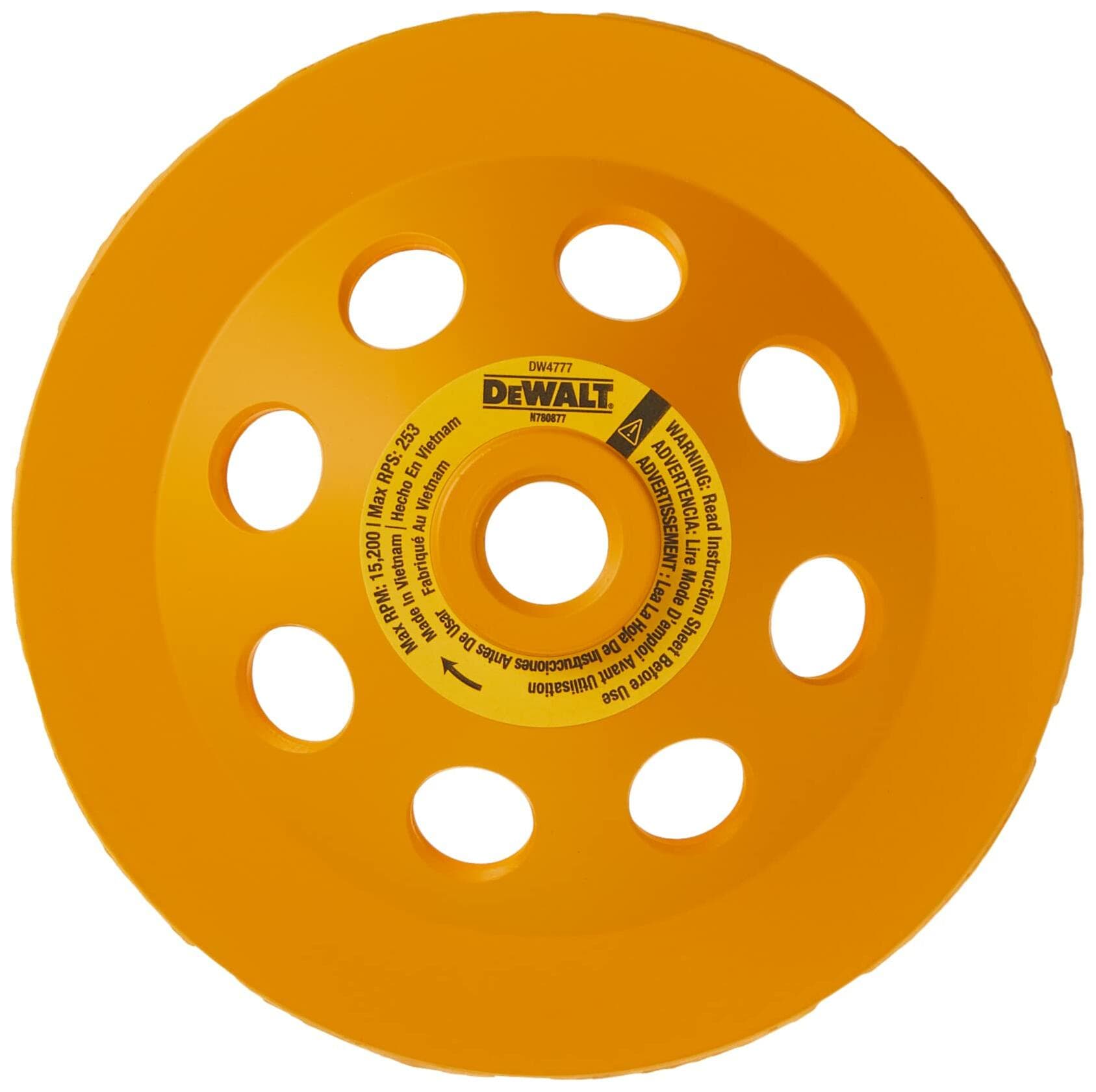 The back of the DEWALT diamond cup wheel, showing the product information label around the central arbor.