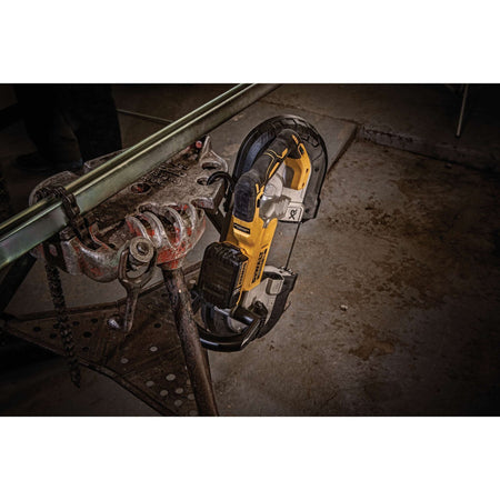 The DEWALT DCS374P2 20V MAX XR cordless portable bandsaw fitted with a 20V battery pack suspended safely by its integrated utility hang hook from a heavy duty pipe chain vise stand