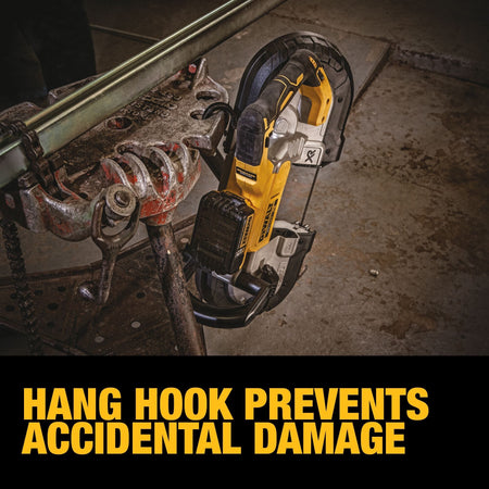 An industrial workshop scene showing the DEWALT DCS374P2 portable bandsaw suspended safely from a pipe vise stand with a bold text overlay highlighting that the hang hook prevents accidental damage to the tool handles