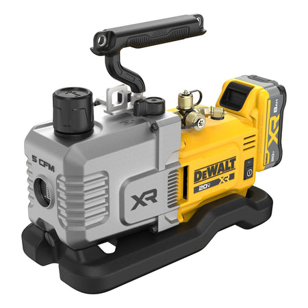 Close-up isometric view of the DEWALT 20V MAX XR cordless vacuum pump highlighting the textured top carry handle, brass mechanical connection ports, gas ballast, and integrated power switch.