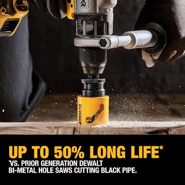 Close-up of DEWALT drill with bi-metal hole saw cutting into black pipe, operated by gloved hand, with text highlighting 50% longer life vs. prior generation.