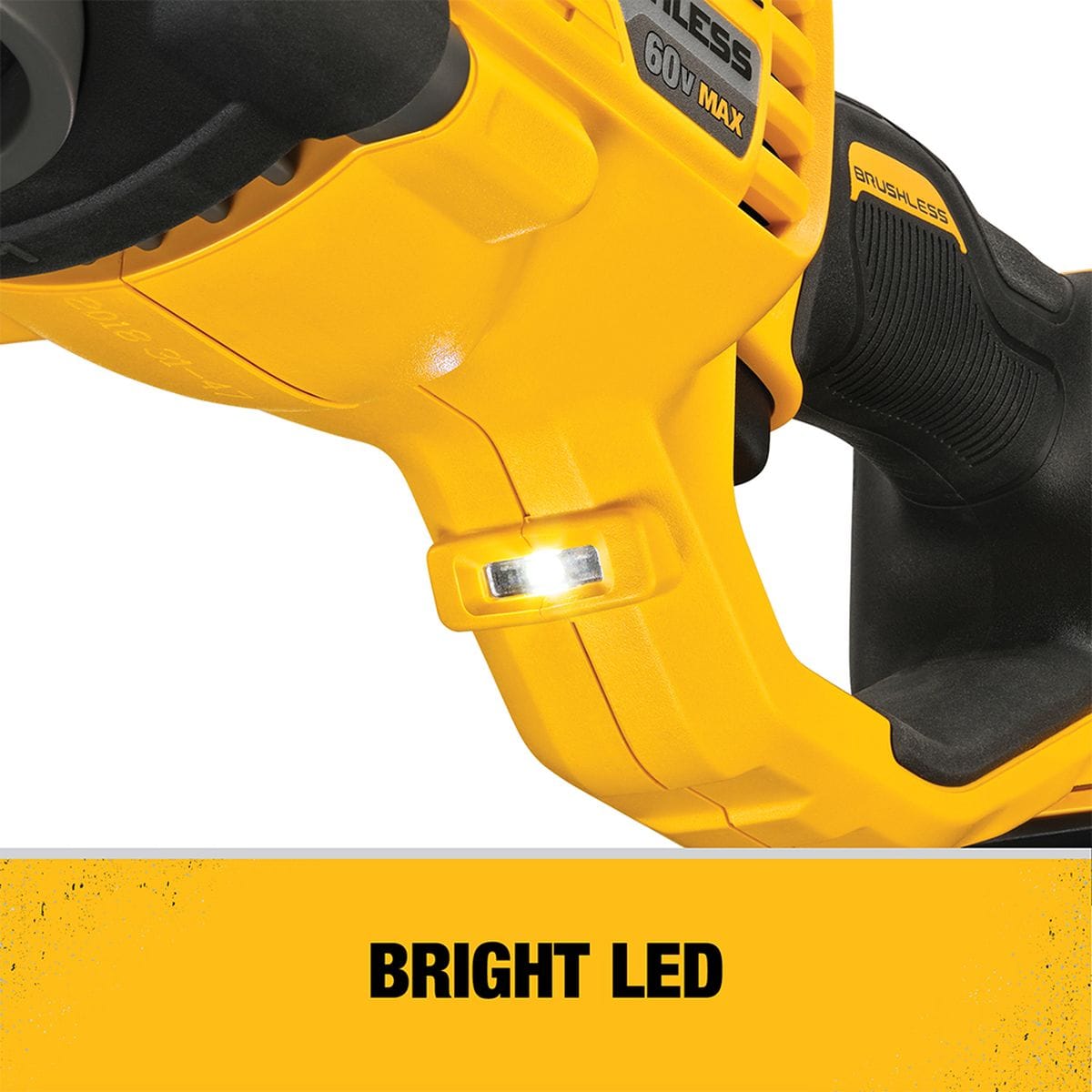 Close-up of the bright LED work light integrated into the base of the DEWALT 60V MAX cordless stud and joist drill handle, providing enhanced visibility in dark plumbing and electrical workspaces.