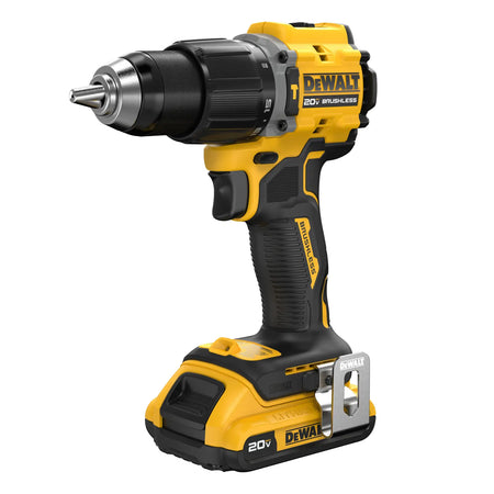 Angled profile of the DEWALT 20V MAX ATOMIC hammer drill highlighting the compact brushless motor housing, 1/2 inch metal ratcheting chuck, and ergonomic textured grip with a metal belt hook.