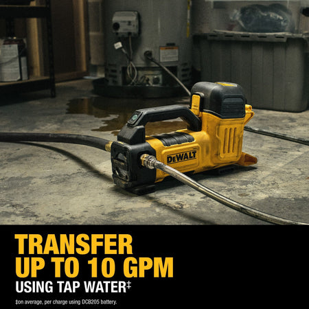 A close-up studio shot of the DEWALT 20V MAX cordless transfer pump resting on a white surface with clear plastic hoses attached to the brass inlet and outlet ports.