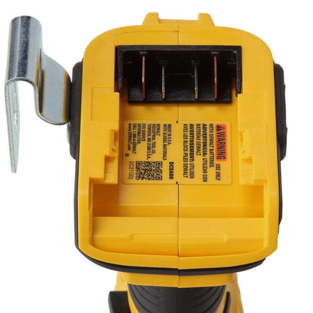 Bottom view of the DEWALT brushless expander tool highlighting the battery terminal connection, electrical contacts, and model identification labeling.