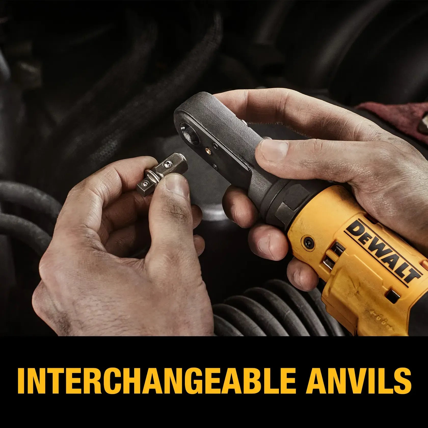 Close-up action shot of a technician’s hands swapping an interchangeable square drive anvil into the sealed head of the DEWALT 12V MAX cordless ratchet.