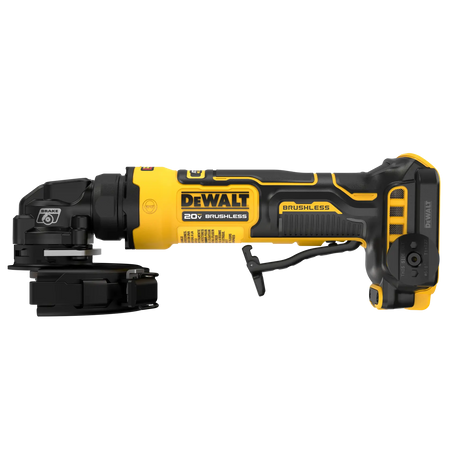 Side profile of the DEWALT ATOMIC 20V MAX cordless angle grinder showcasing the safety paddle switch and the durable yellow and black housing designed for tight spaces.