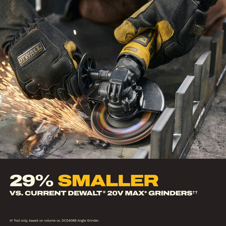 A professional fabricator using the DEWALT 20V MAX 4-inch cordless angle grinder to grind a steel component, highlighting its design which is 29 percent smaller than standard DEWALT grinders.