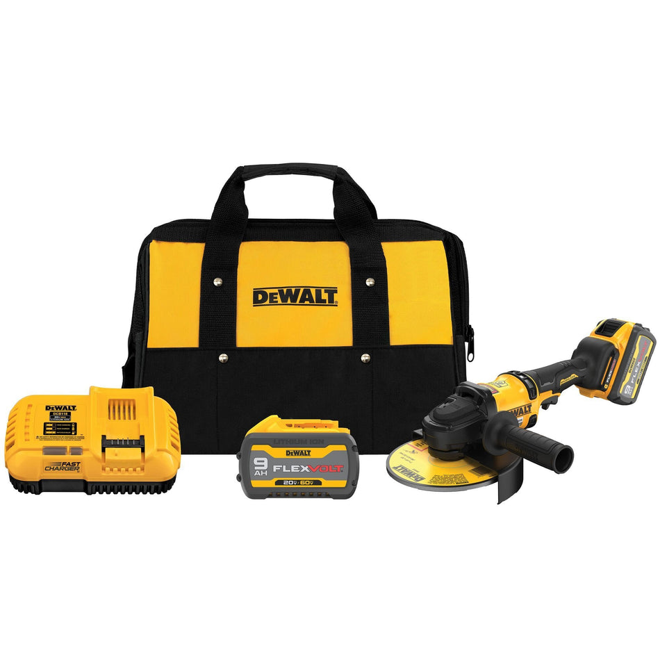 The complete DEWALT DCG440X2 kit including the 60V MAX brushless 7-inch angle grinder, two 9.0Ah FLEXVOLT batteries, a fast charger, and a heavy-duty yellow and black contractor bag.