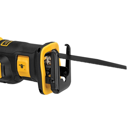 The DEWALT XR Brushless Reciprocating Saw head with a demolition blade installed, focusing on the rugged construction and safety lock-off switch for professional demolition and framing applications.