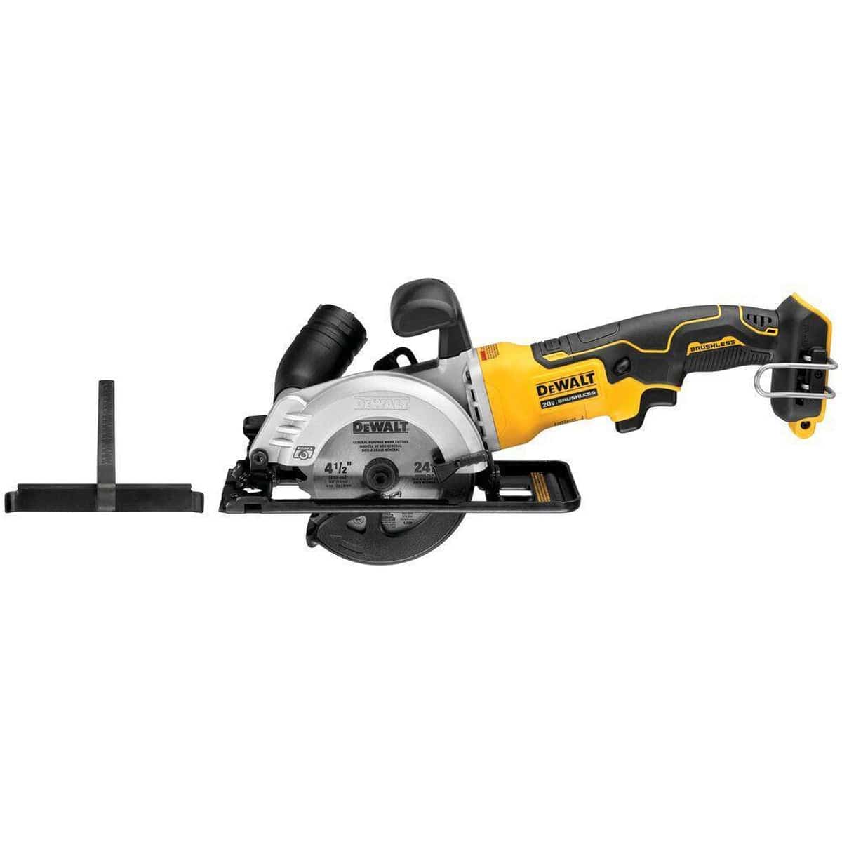 DEWALT DCS571B ATOMIC 20V MAX brushless 4-1/2 inch cordless compact circular saw shown with included wood cutting blade, rip fence, and dust port adapter accessories for versatile trim work.