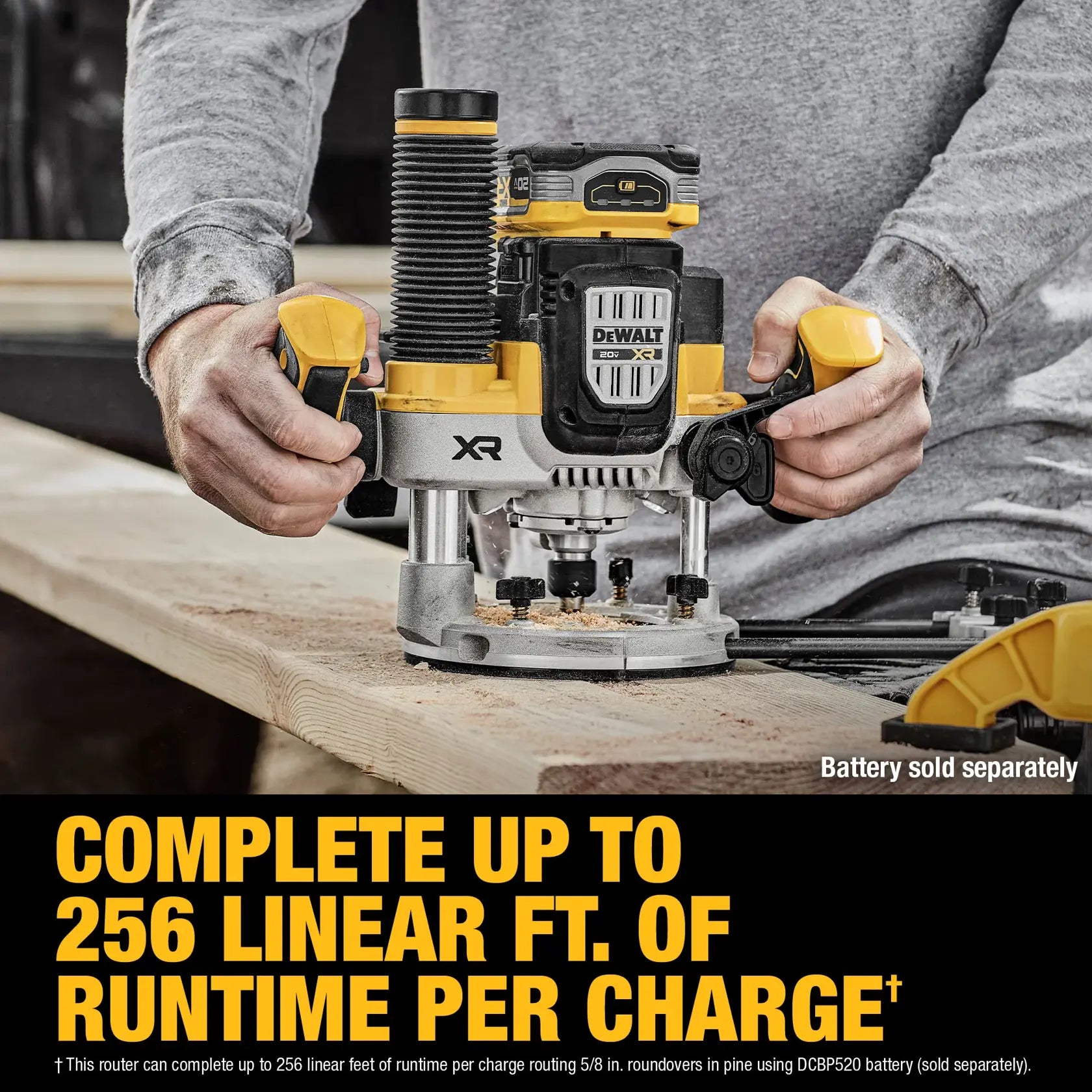Action shot of a woodworker routing a 5/8-inch roundover in pine with the DEWALT DCW620B, featuring an overlay highlighting its extreme productivity of up to 256 linear feet of runtime per charge.