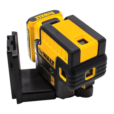 Isometric perspective view of the DEWALT 5 Spot Green Laser level, emphasizing the overmolded housing and the various laser apertures for projecting Up, Down, Front, Left, and Right points.