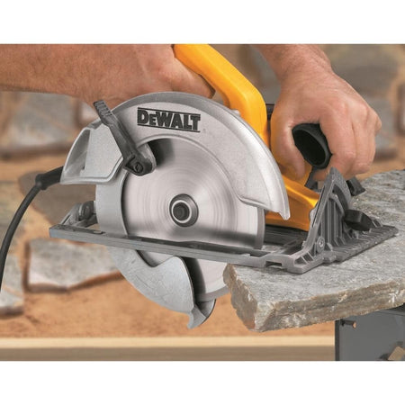 An action photo showing a professional using a DEWALT circular saw equipped with a 7-inch high-performance turbo diamond blade to perform a precise dry cut through a natural stone slab.