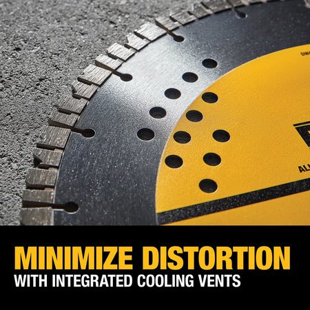 A detailed close-up shot of the DEWALT 14-inch diamond blade resting on a textured concrete surface. The focus is on the integrated cooling vents and the aggressive turbo segmented rim, illustrating the design used to minimize distortion and heat buildup during heavy-duty cutting.