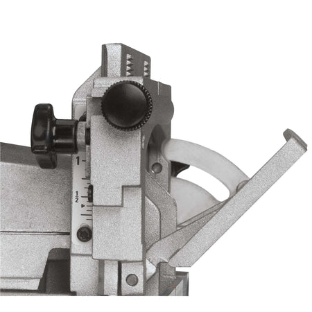 Close-up view of the adjustable dual rack and pinion fence mechanism on the DEWALT corded electric biscuit joiner, ensuring precise blade parallelism for accurate carpentry joints.