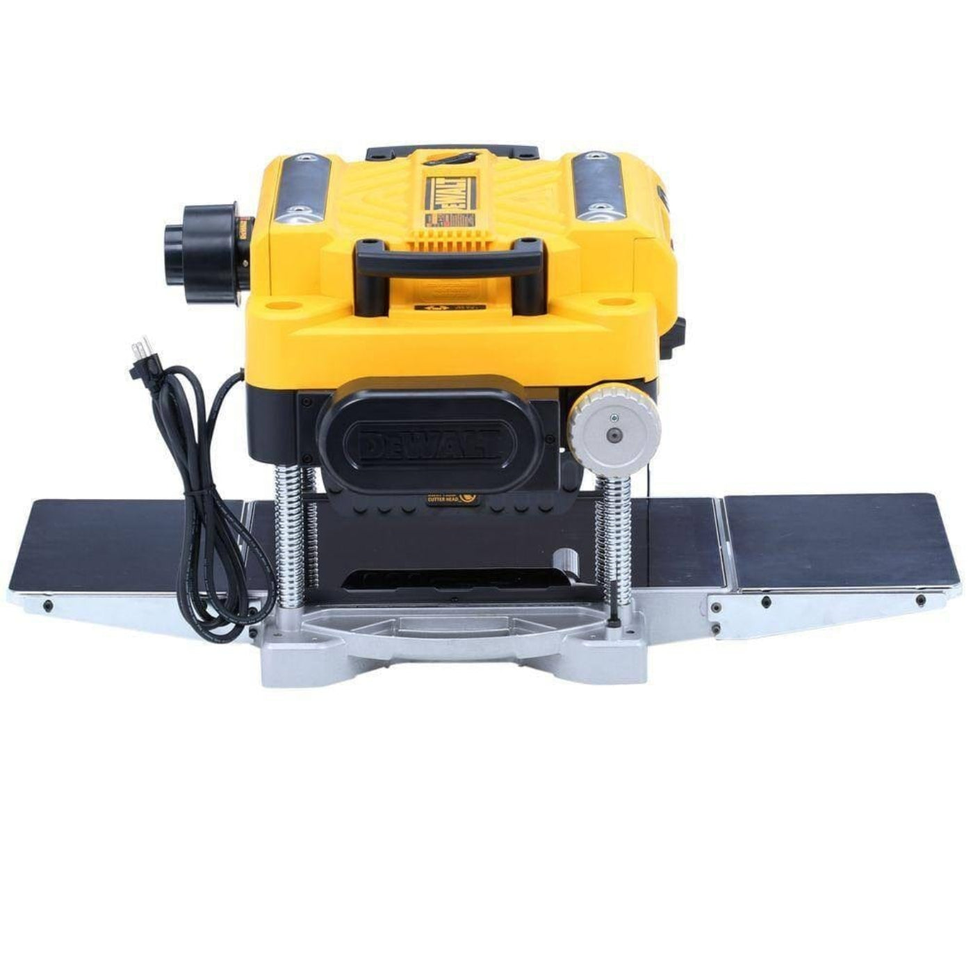 Rear eye-level view of the planer showing the dust ejection port, power cord management, and the rear outfeed table.
