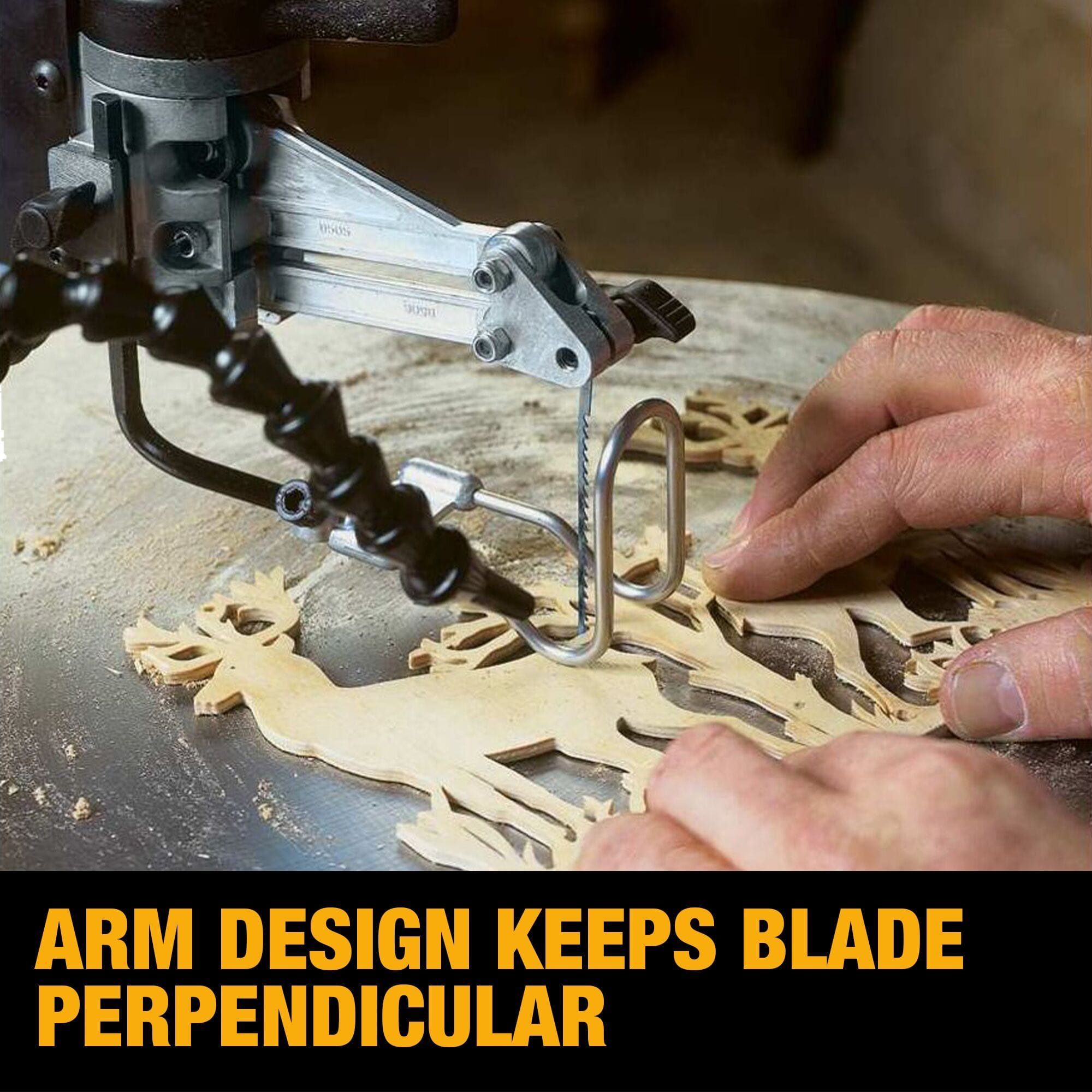 Close-up detail of the DEWALT scroll saw's upper arm highlighting the blade perpendicularity and the integrated flexible dust blower keeping the cut line clear.