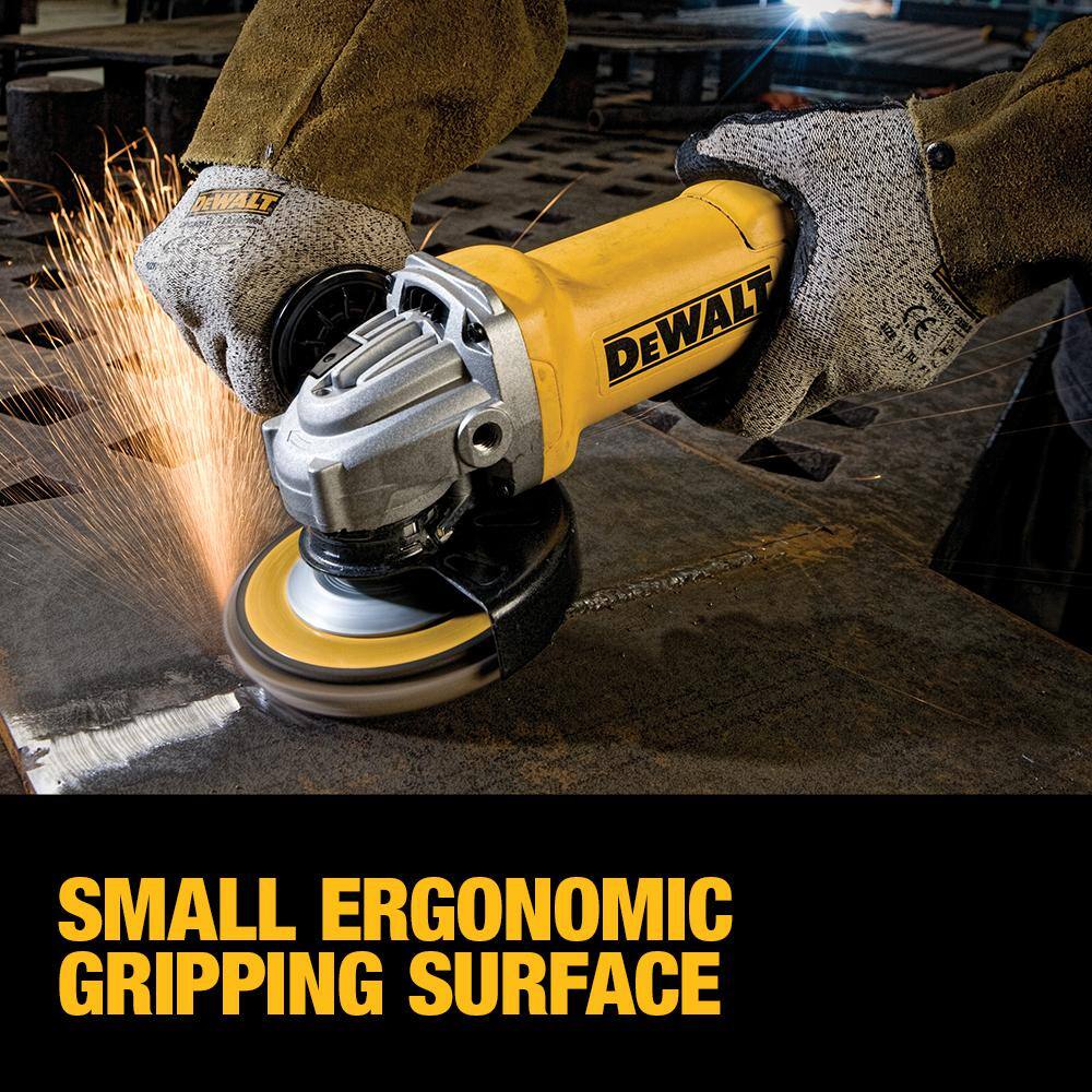 Close-up action photograph of the DEWALT 11-Amp grinder performing a heavy-duty cutting operation on industrial pipe. A stream of sparks highlights the high material removal rate of the 11,000 RPM motor, demonstrating the power and accuracy professionals require for fabrication tasks.