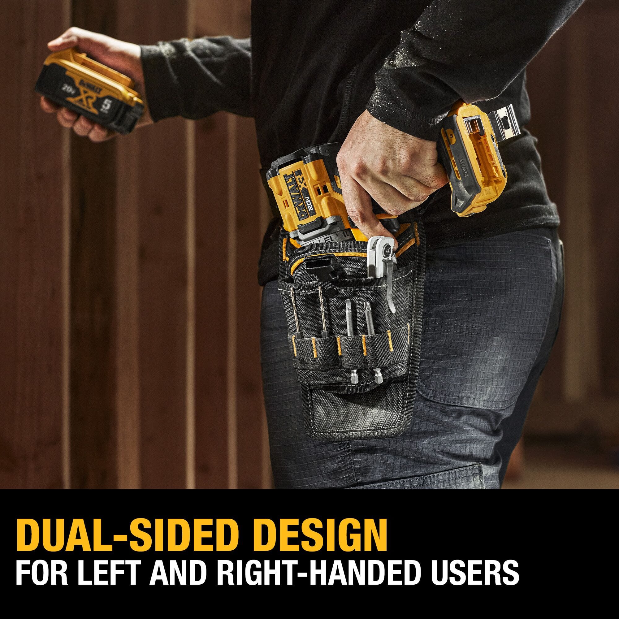 An action lifestyle shot of a worker wearing the DEWALT ambidextrous tool belt pouch. The image features a text overlay stating DUAL-SIDED DESIGN FOR LEFT AND RIGHT-HANDED USERS, illustrating the holster's versatility while holding a drill and various hand tools on the jobsite.
