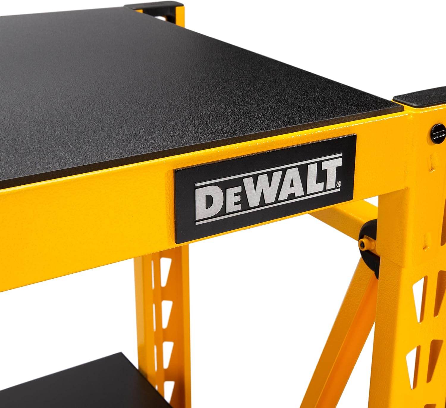 Close-up detail of the top right corner of the rack showing the black DEWALT logo badge and the solid laminate shelf surface.