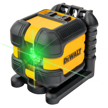 Three-quarter view of the DEWALT DW08802CG self-leveling laser level projecting a high-visibility green cross line beam with a rugged over-molded housing for jobsite protection.
