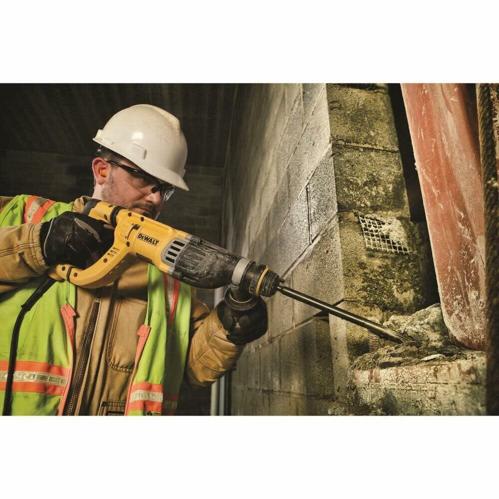 DEWALT SDS+ 1-1/8" Rotary Hammer Drill with Vibration Control in use for heavy-duty concrete drilling on jobsite