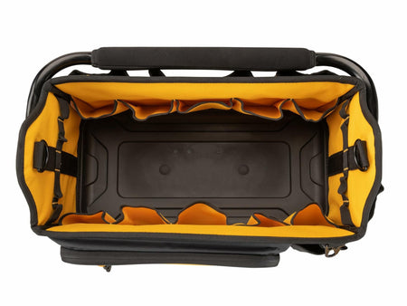 Top-down view of an empty DEWALT tool tote showing a yellow interior with multiple side pockets. The base is black and reinforced for durability, designed to support heavy tools and accessories.