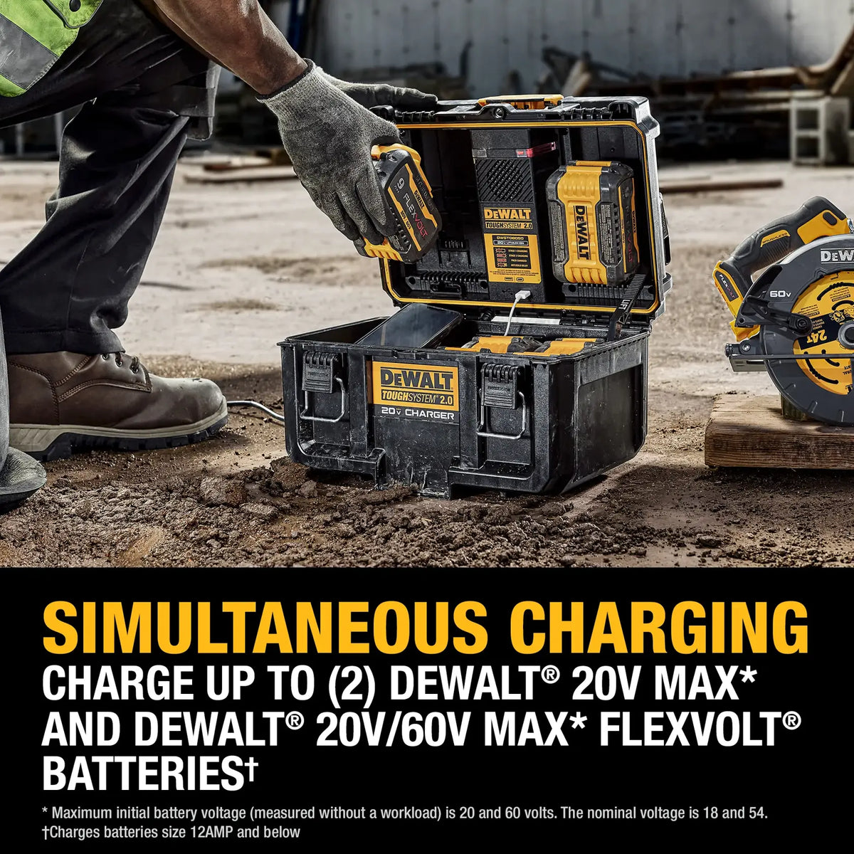 An action lifestyle shot of a professional worker inserting a FLEXVOLT battery into the DEWALT ToughSystem charger box on a dusty construction site. The image demonstrates the simultaneous charging capability and the industrial durability of the IP55-rated housing.