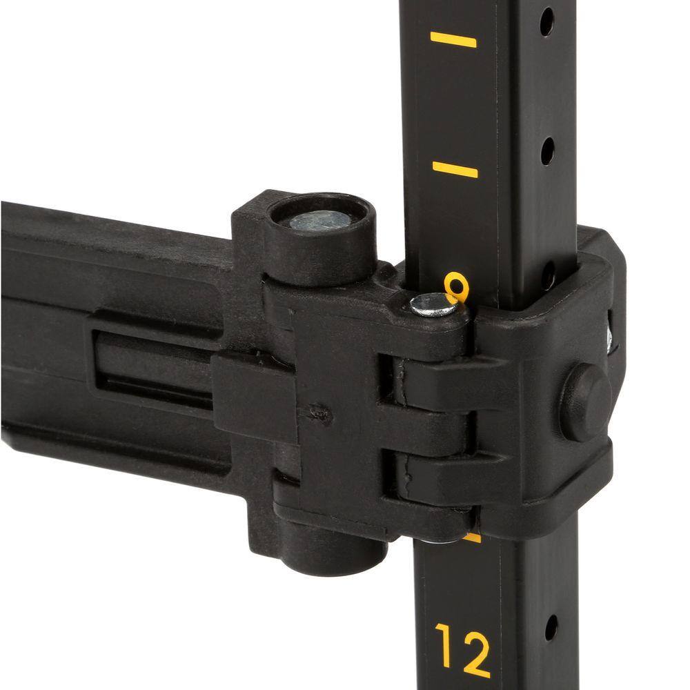 A detailed close-up of the adjustable mounting bracket on the DEWALT ToughSystem DS Carrier. The image shows the heavy-duty locking hinge and yellow numbered height markings on the vertical rail, allowing for precise customization of tool box configurations.
