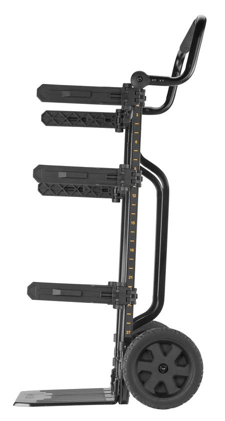 A side profile of the ToughSystem DS Carrier transport rack. The image emphasizes the ergonomic handle, the large diameter rugged wheels for navigating jobsite debris, and the vertical rail system used to secure multiple DEWALT storage modules.