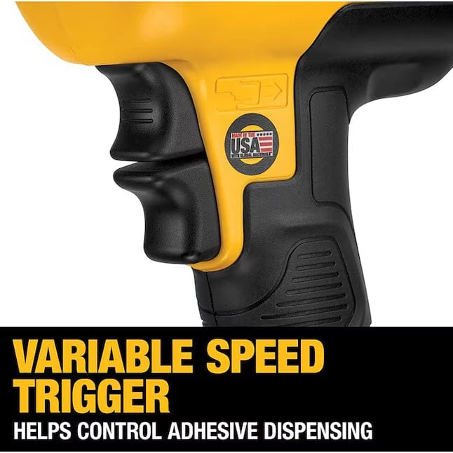 Close-up of DeWalt adhesive gun handle with “VARIABLE SPEED TRIGGER” label and sticker indicating made in the USA with global materials.