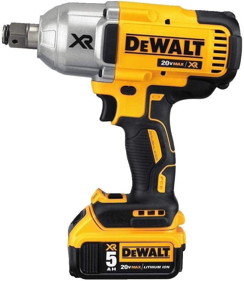 Close-up of DeWalt XR impact wrench with attached 5.0Ah battery, featuring brushless motor and rugged yellow-black design for high torque applications.