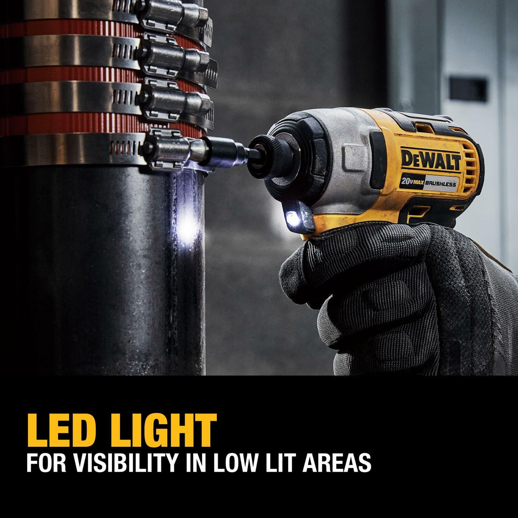 The DeWalt impact driver's LED light illuminates a dark workspace while fastening a screw. Text reads: LED LIGHT FOR VISIBILITY IN LOW LIT AREAS.