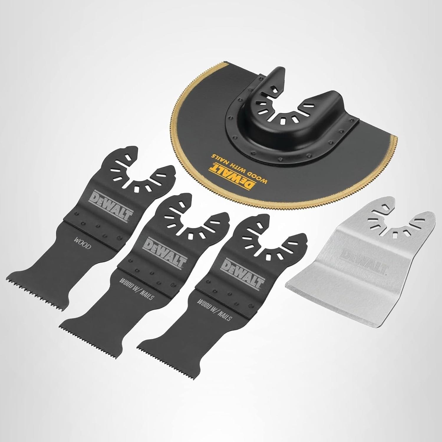 Studio view of five DeWalt oscillating tool blades including a titanium coated semi-circle blade, three black plunge cut blades, and a silver scraper blade against a gray background.