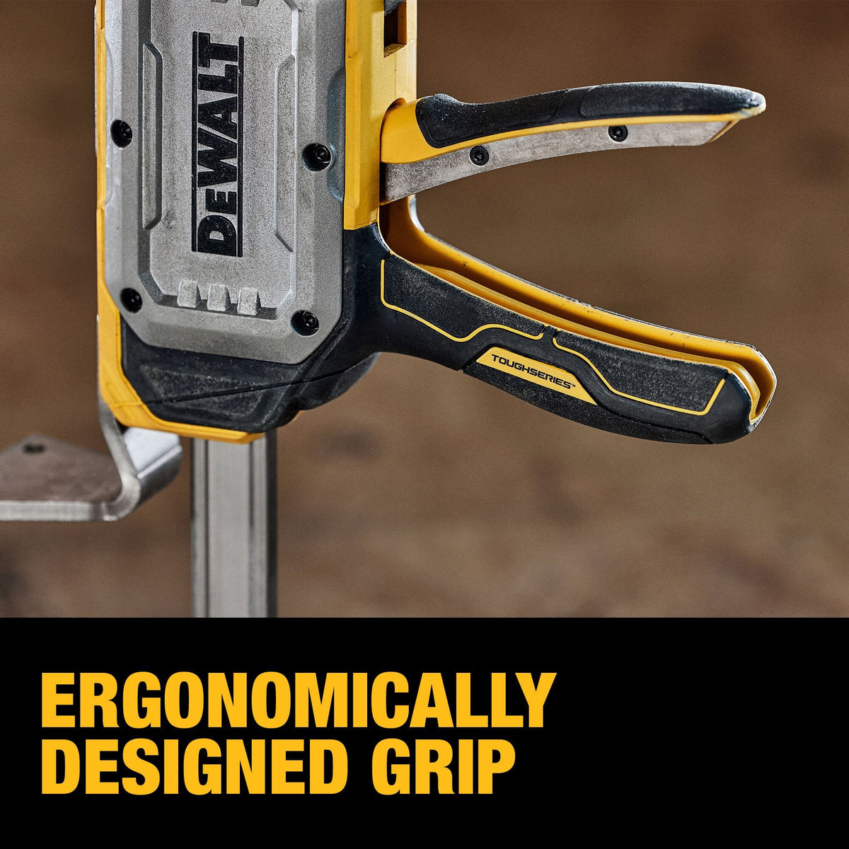 Close-up view of DeWalt ToughSeries ergonomic trigger handle with metal reinforcing ribs for comfortable high-load pumping.