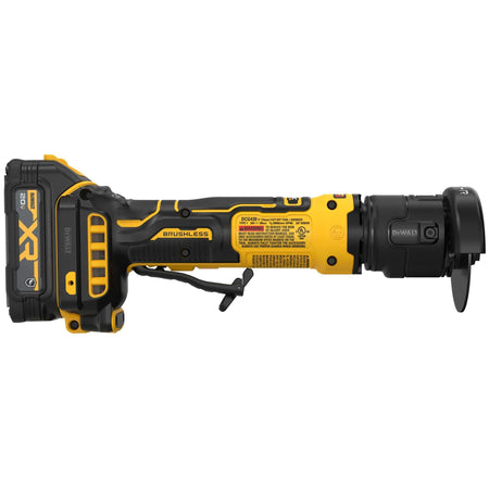 DeWalt compact 20V MAX cordless brushless 3-inch cut-off saw right side linear view highlighting the main technical specification warning label plate tracking industrial safety compliance badges, along with the reverse side profile of the yellow motor housing shell and adjustable black wheel shield guard