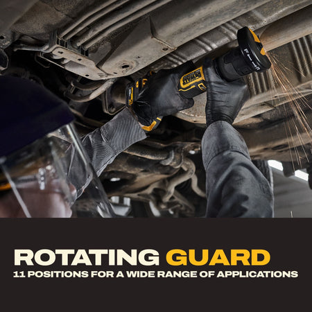 Industrial jobsite application graphic highlighting an automotive mechanic wearing protective safety face shields and black nitrile gloves manipulating the DeWalt 20V MAX cordless compact 3-inch cut-off saw to trim an under-car metal exhaust tailpipe, throwing off hot friction sparks, under a promotional text layout emphasizing that the 11-position rotating guard handles a wide range of applications safely