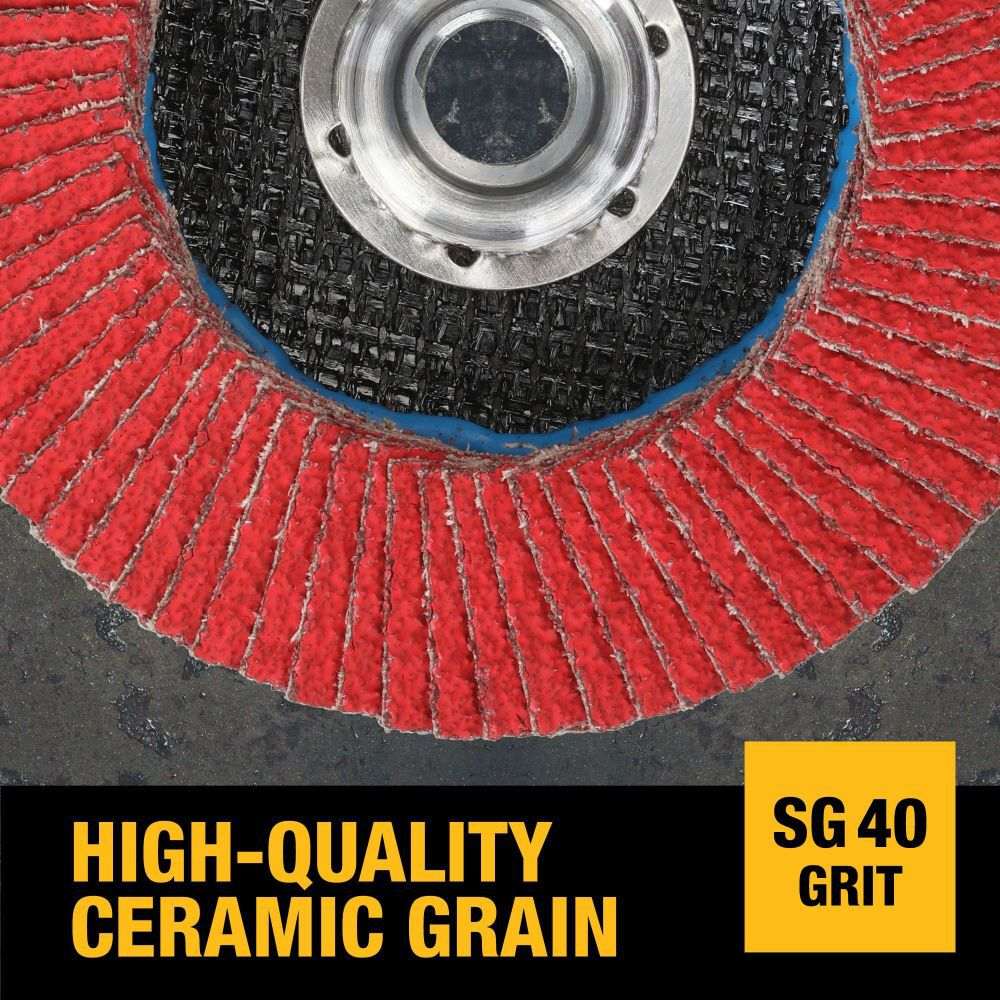 A close-up photograph of the red high-quality ceramic grain on a DeWalt XP jumbo flap disc, highlighting the aggressive 40-grit texture and industrial backing.