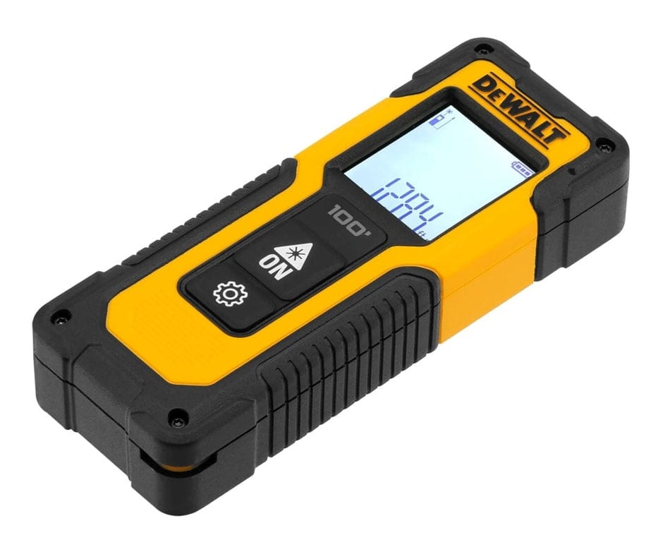 Side angled view of the compact laser measuring tool, highlighting the textured black overmold designed for a secure grip and jobsite durability.