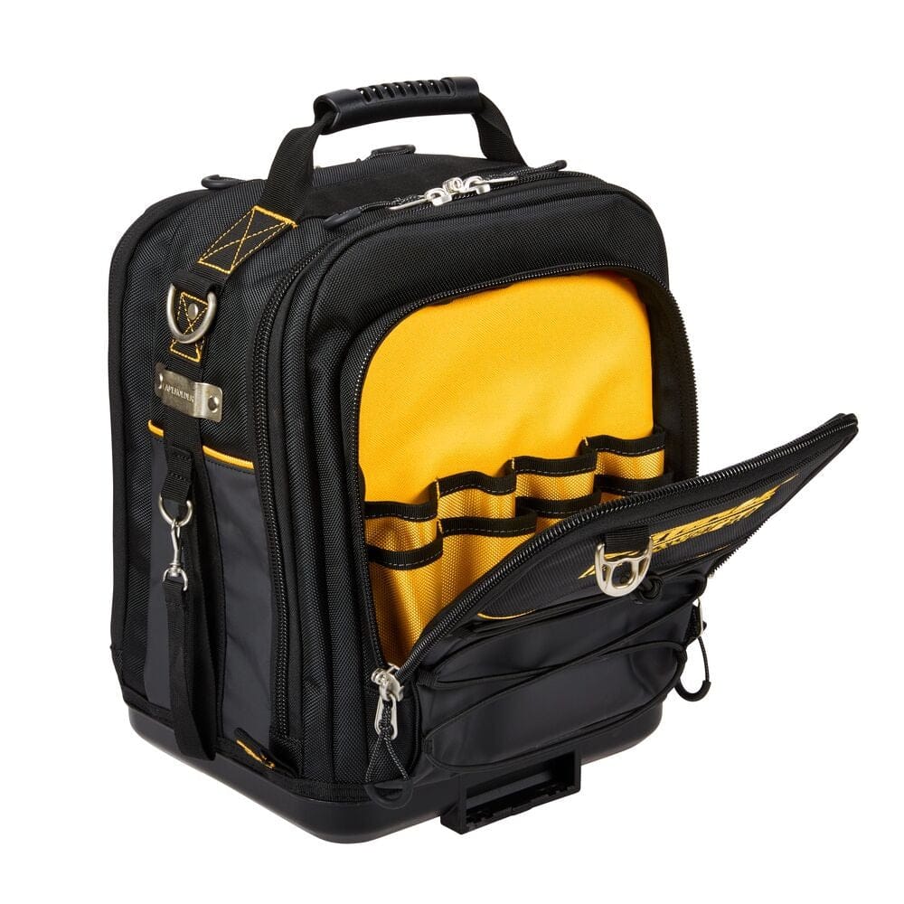 DeWalt ToughSystem 2.0 compact tool bag with the main compartment unzipped, revealing the bright yellow interior containing multiple vertical pockets for organizing tools. The rugged top handle, attached shoulder strap, side tape clip, and waterproof base are visible.