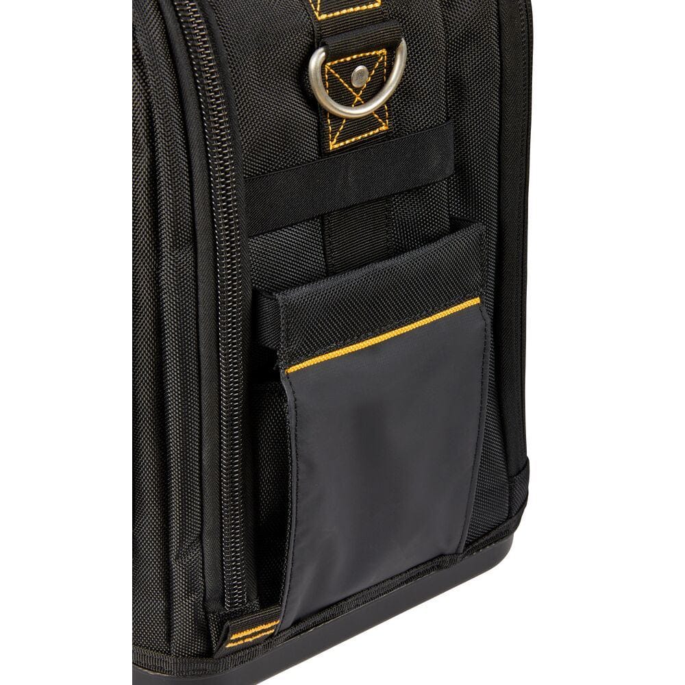 Close-up detailing the side of the black tool bag fabric, featuring a sturdy metal D-ring for the shoulder strap attachment and a closed accessory pocket accented with yellow stitching.