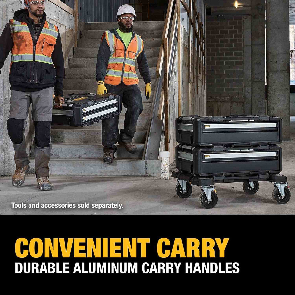 Action shot of two construction workers carrying a stack of two deep drawer units down a flight of concrete stairs using the side handles, captioned Convenient Carry.
