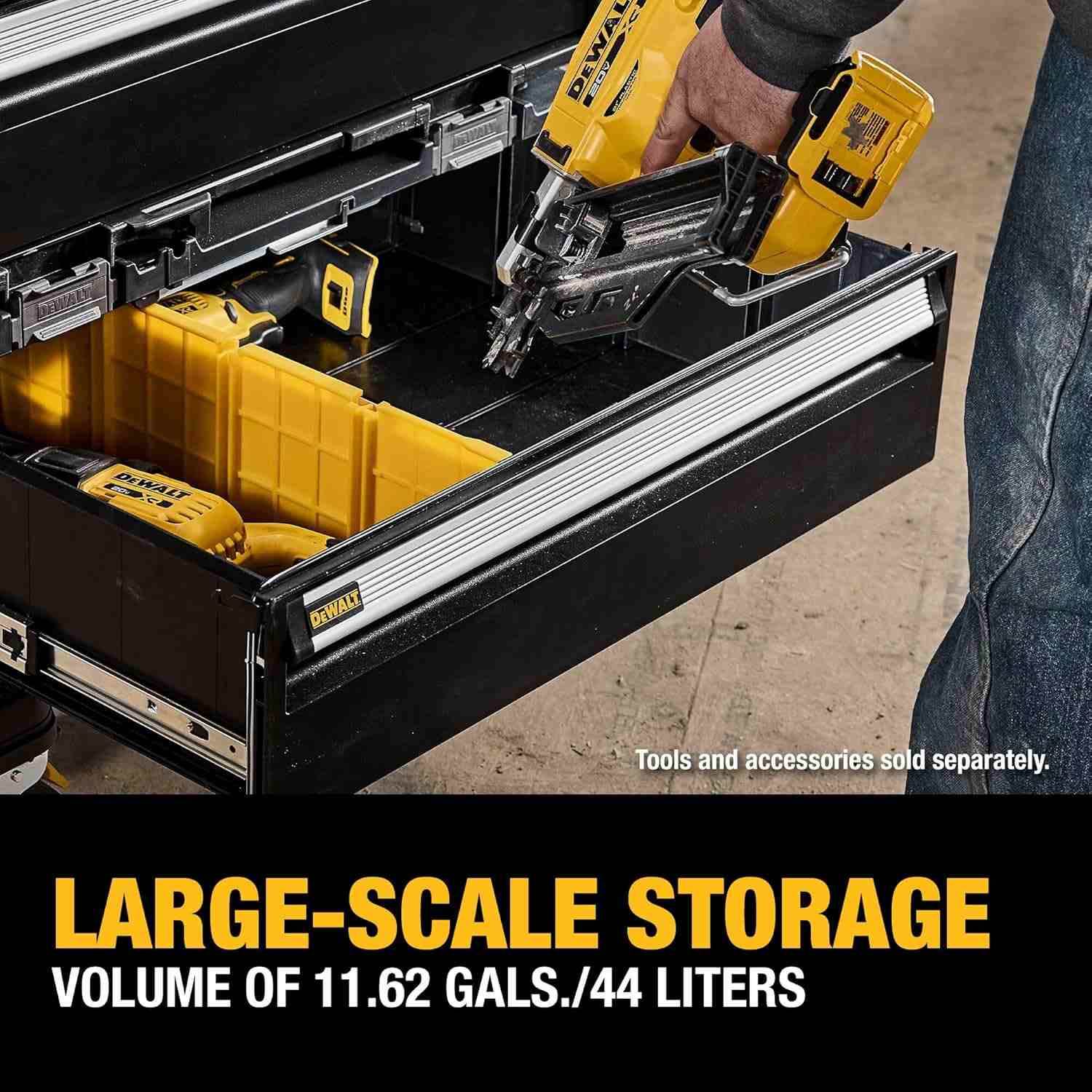Action shot of a worker placing a yellow DeWalt nail gun into the open drawer alongside other power tools, captioned Large-Scale Storage.